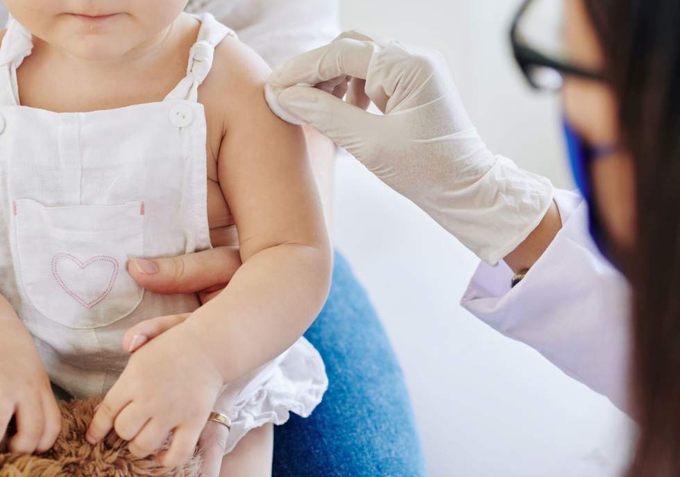 Small child getting vaccinated