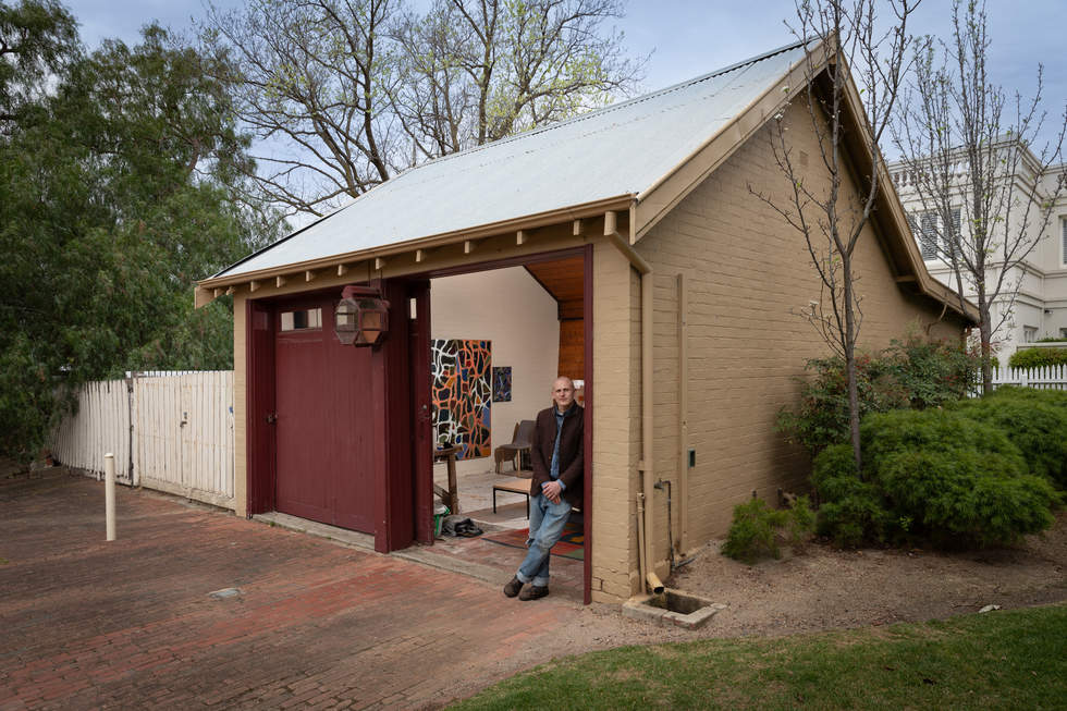 An artist standing in front of a studio at Billilla Mansion 