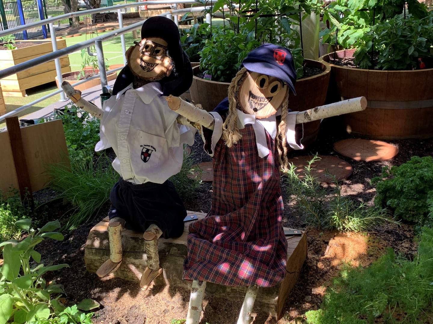 two scarecrow in garden
