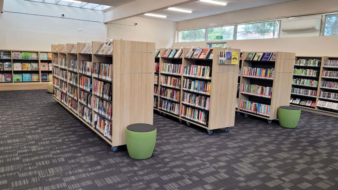 Interior of Hampton Library with new wheelable shelves filled with books