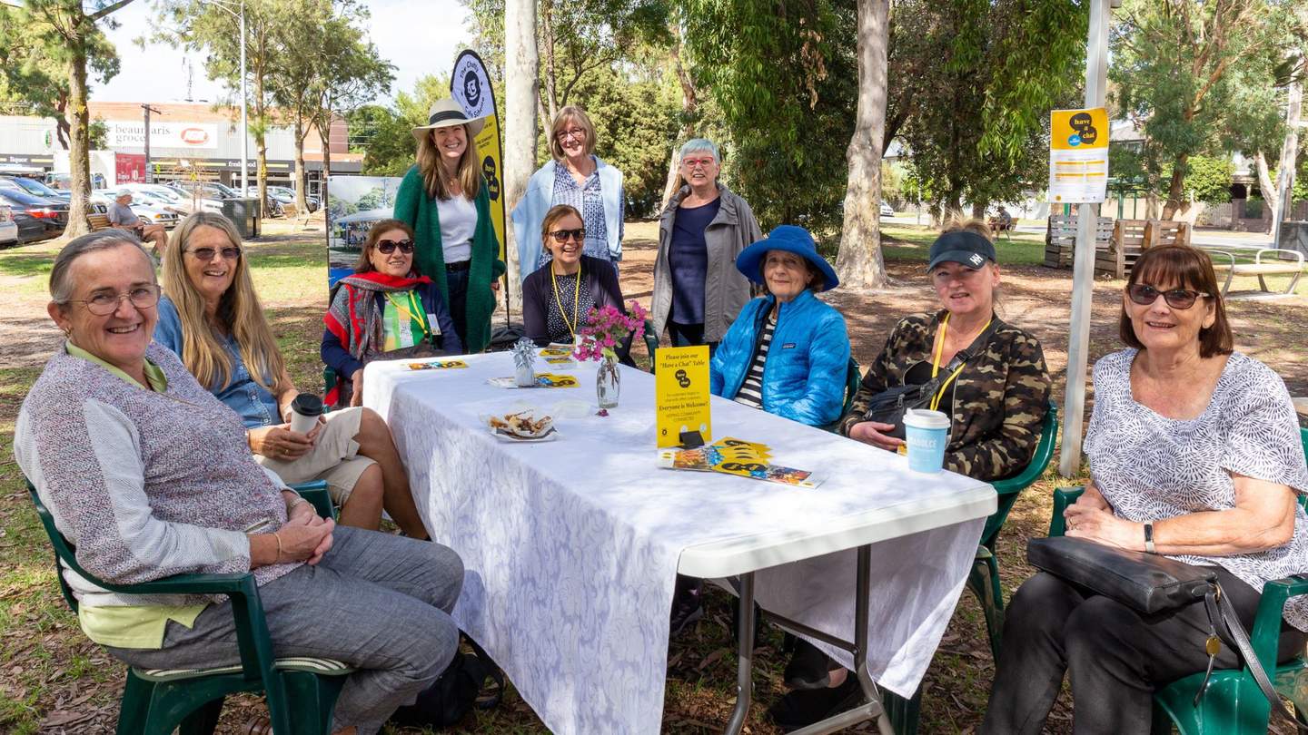 Group of people at Chatty Cafe table