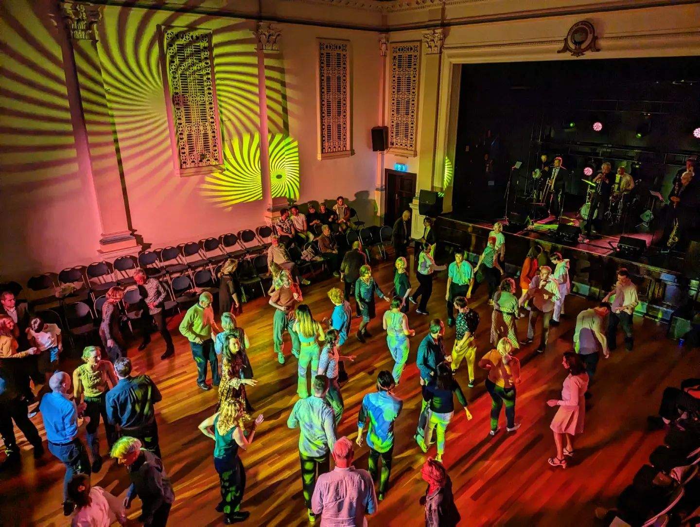 People dancing in a hall