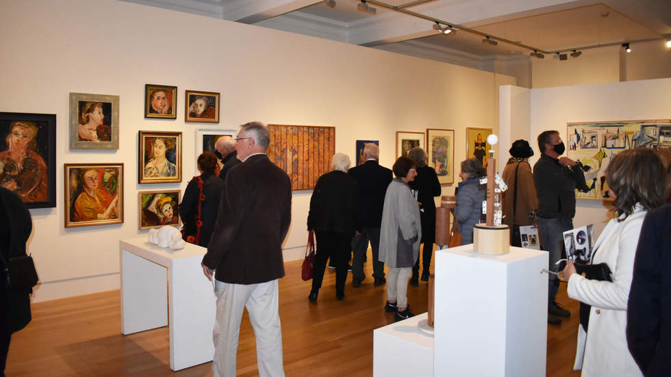 People exploring the Eyes that see: the collection of Norman Rosenblatt exhibition at the opening event